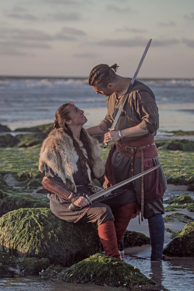 Male and female viking warrior couple outdoors